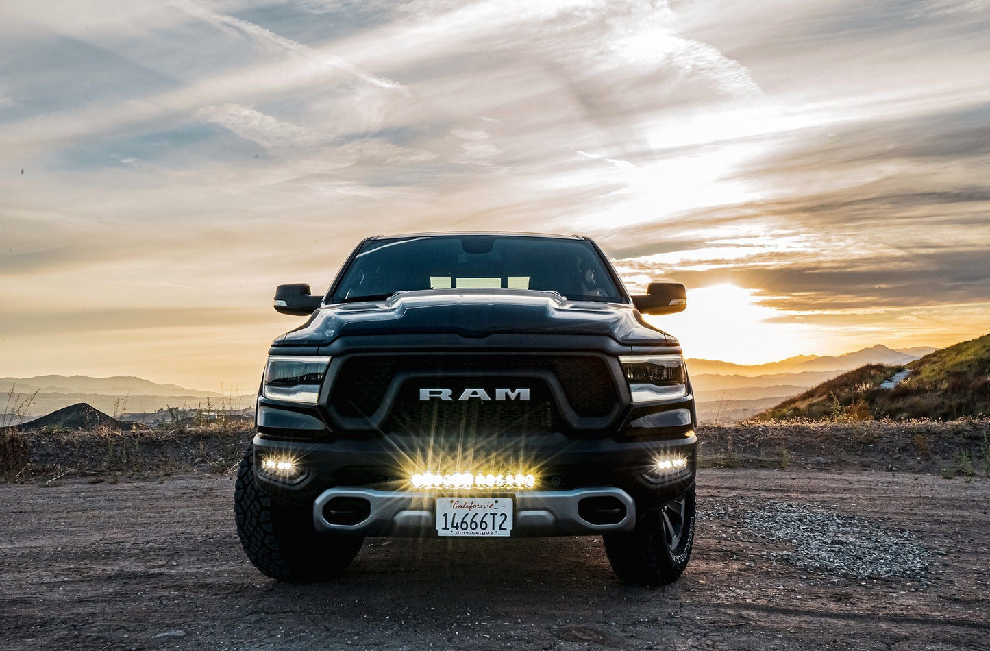 '19-22 Ram 1500 Rebel/TRX 20" Light Bar Bumper Kit Lighting Baja Designs 20" OnX6+ Series Display on Vehicle in Use (front view)