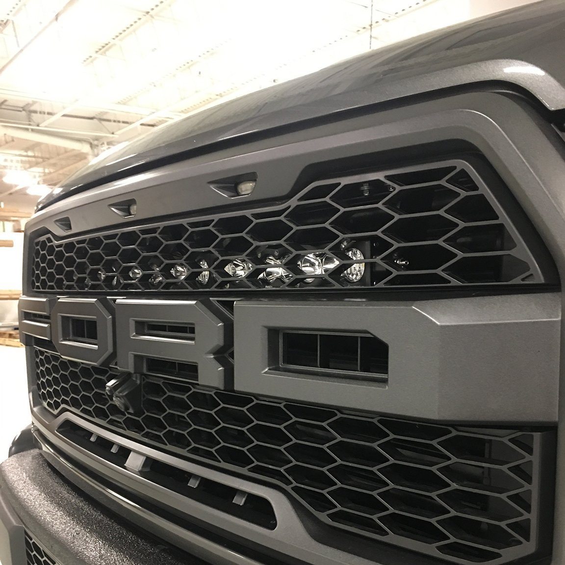 '17-20 Ford Raptor 30" S8 Behind the Grille Mount Lighting Baja Designs close-up Display 